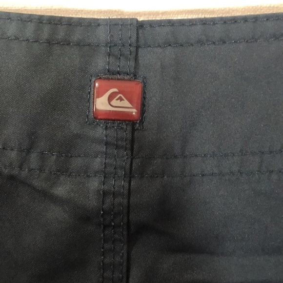 QUICKSILVER navy blue board shorts, size 42 - Picture 6 of 7